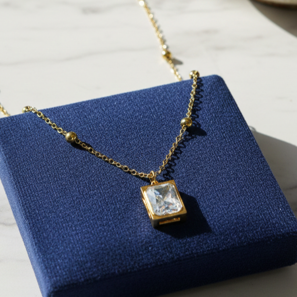 Noor Radiant Emerald-Cut Pendant – 18K Gold Plated Satellite Necklace