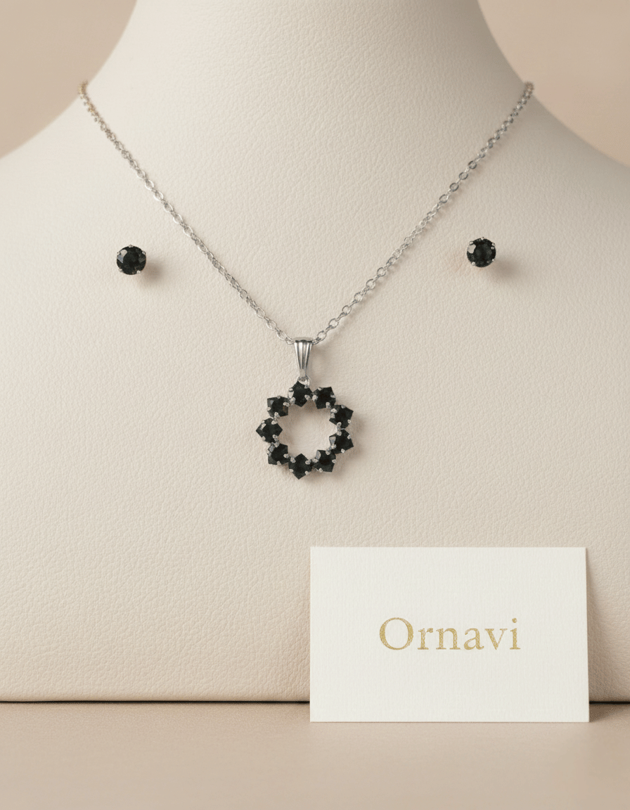 Jewelry set with necklace and earrings on a mannequin bust, featuring the brand 'Ornavi'.