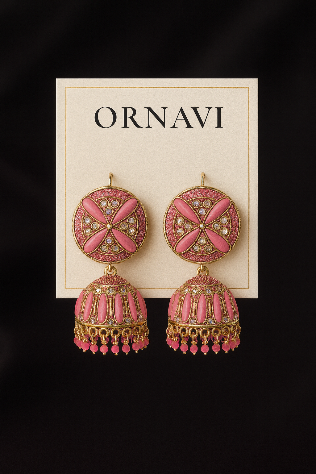 Pink and gold earrings on an ORNAVI branded card against a black background