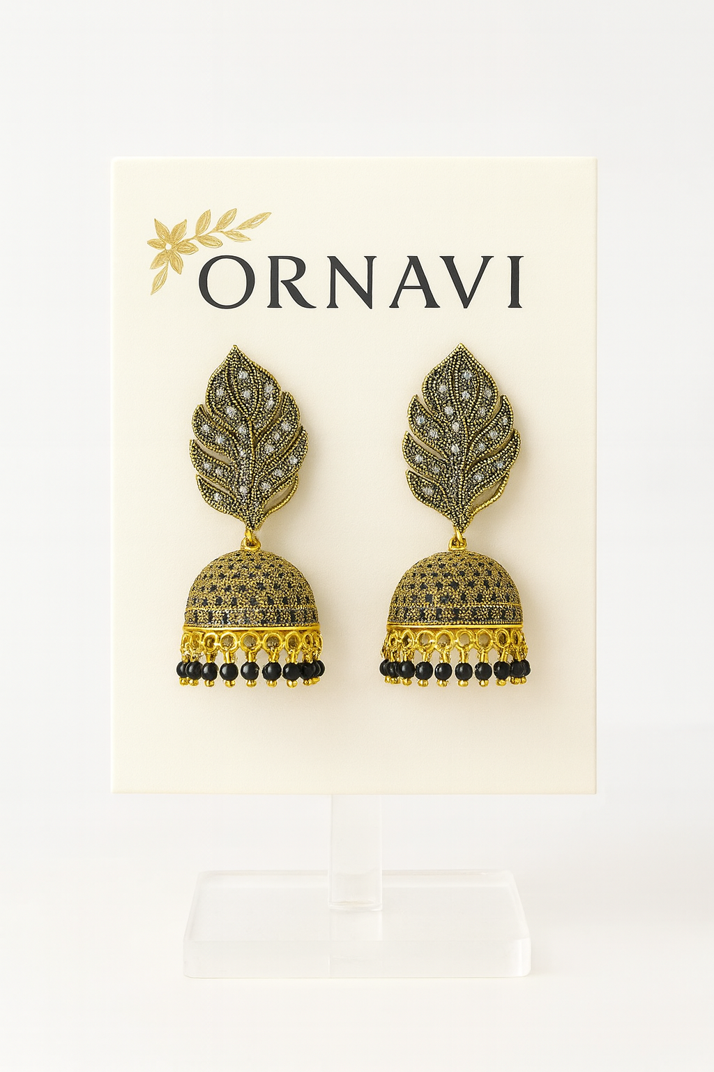 black leaf earrings on a display stand with 'ORNAVI' branding on a white background