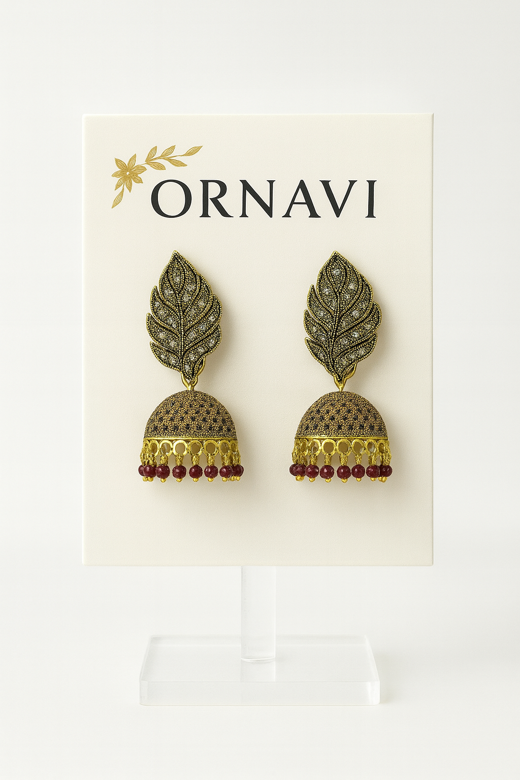 red leaf earrings on a display stand with 'ORNAVI' branding on a white background